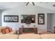 Living room showcasing stylish artwork above a fireplace and comfortable seating at 1926 Bluff Dr., Myrtle Beach, SC 29577