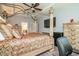 Main bedroom with large four poster bed, TV, and access to the en-suite bathroom at 1926 Bluff Dr., Myrtle Beach, SC 29577