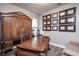 Home office with large desk and ornate wooden hutch at 1926 Bluff Dr., Myrtle Beach, SC 29577