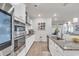 Stainless steel appliances and granite countertops in kitchen at 2020 Santa Maria St., Myrtle Beach, SC 29579