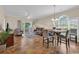 Spacious living room featuring tile floors, ceiling fan and access to an outdoor balcony at 4709 Wild Iris Dr. # 104, Myrtle Beach, SC 29577