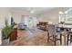 Inviting living space with tile flooring, a sofa, an accent chair, and access to the outdoor patio at 4709 Wild Iris Dr. # 104, Myrtle Beach, SC 29577