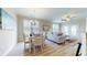 Bright dining area with four chairs and a chandelier at 81 Delray Dr. # 2-A, Murrells Inlet, SC 29576