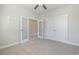 Neutral bedroom featuring French doors, plush carpet, and closet at 112 Infinity Ln., Loris, SC 29569
