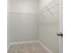 Walk-in closet offers ample storage space with shelving and carpeting at 112 Infinity Ln., Loris, SC 29569