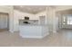 Stylish kitchen with white cabinets, stainless steel appliances, and granite countertops on the center island at 112 Infinity Ln., Loris, SC 29569