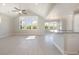 Open concept living space showcasing connecting kitchen and living room filled with natural light at 112 Infinity Ln., Loris, SC 29569
