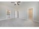 Spacious main bedroom with ensuite bathroom and walk-in closet offers comfort and convenience at 112 Infinity Ln., Loris, SC 29569