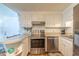 Kitchen with stainless steel appliances and white cabinets at 1203 Erin Way # B, Myrtle Beach, SC 29577