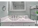 Bathroom with a mirror and a white vanity with lots of counter space at 1207 S Ocean Blvd. # 20509, Myrtle Beach, SC 29577