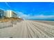 Beautiful oceanfront view of a pristine beach with soft sand and calm water at 1207 S Ocean Blvd. # 20509, Myrtle Beach, SC 29577