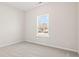 Comfortable bedroom features plush carpet, natural light, and neutral paint at 343 Hayloft Circle, Conway, SC 29526