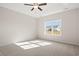 Spacious bedroom with a ceiling fan and a large window offering a beautiful view at 343 Hayloft Circle, Conway, SC 29526