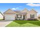 Charming single-Gathering home with a well-manicured lawn, brick accents, and a two-car garage at 343 Hayloft Circle, Conway, SC 29526