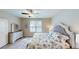 Bright bedroom featuring a king-size bed and plenty of natural light at 35 Delray Dr. # 1-E, Murrells Inlet, SC 29576