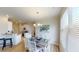 Charming dining area with a rustic table and chairs, perfect for intimate meals at 35 Delray Dr. # 1-E, Murrells Inlet, SC 29576