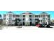 Two-story apartment building with light green exterior and balconies at 35 Delray Dr. # 1-E, Murrells Inlet, SC 29576