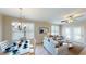 Open concept living and dining area with hardwood floors and neutral tones at 35 Delray Dr. # 1-E, Murrells Inlet, SC 29576