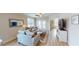 Living room with comfy sofas, a large TV, and access to a patio at 35 Delray Dr. # 1-E, Murrells Inlet, SC 29576