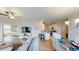 Open concept living space with a view into the kitchen, dining area and bedroom at 35 Delray Dr. # 1-E, Murrells Inlet, SC 29576