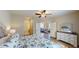 Bright main bedroom with a comfortable bed and access to the living room and bathroom at 35 Delray Dr. # 1-E, Murrells Inlet, SC 29576