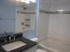 Clean bathroom, granite countertop, tiled shower and tub at 5601 Ocean Blvd. N # 202 A, Myrtle Beach, SC 29577