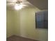 Light green bedroom with carpet, window, and ceiling fan at 5601 Ocean Blvd. N # 202 A, Myrtle Beach, SC 29577