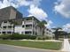 Building exterior with balconies and landscaping at 5601 Ocean Blvd. N # 202 A, Myrtle Beach, SC 29577