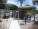 Community grilling station with picnic tables and seating at 5601 Ocean Blvd. N # 202 A, Myrtle Beach, SC 29577