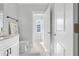 Bathroom showcasing a granite countertop, neutral color scheme and view of the exterior at Lot 42 Lineback Pl. # 42, Longs, SC 29568