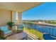 Balcony with wicker furniture and water views at 2151 Bridge View Ct. # 2-902, North Myrtle Beach, SC 29582