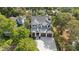 Aerial shot of a gorgeous home with mature trees and a large driveway at 405 N Highland Way, Myrtle Beach, SC 29572
