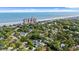 An aerial view shows real estate nestled within a beautiful coastal town, near the beach and ocean at 405 N Highland Way, Myrtle Beach, SC 29572