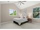 Bright bedroom with plush carpet, lots of sunlight, and closet at 405 N Highland Way, Myrtle Beach, SC 29572