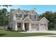 Two-story house with gray siding, white trim, and a two-car garage at 405 N Highland Way, Myrtle Beach, SC 29572