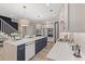 Stylish kitchen with a large island, custom cabinetry, and stainless steel appliances at 405 N Highland Way, Myrtle Beach, SC 29572