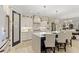 Modern kitchen with a large island, pendant lighting, and white cabinets at 405 N Highland Way, Myrtle Beach, SC 29572