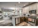 Spacious kitchen with granite countertops and stainless steel appliances at 405 N Highland Way, Myrtle Beach, SC 29572