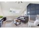 Cozy living room with vaulted ceilings, stylish decor, and plenty of natural light at 405 N Highland Way, Myrtle Beach, SC 29572