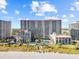 Panoramic aerial view featuring the condo buildings, ocean, and beach. Features a picturesque beachfront setting at 7200 Ocean Blvd. N # 254, Myrtle Beach, SC 29572