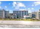 Beautiful aerial view of the condo buildings, pool, and beach. Features a picturesque beachfront setting at 7200 Ocean Blvd. N # 254, Myrtle Beach, SC 29572