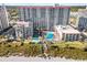 Aerial view of resort highlighting its pool, manicured grounds, and beach access at 7200 Ocean Blvd. N # 254, Myrtle Beach, SC 29572