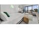 Cozy bedroom with balcony access, complemented by a comfortable seating area and beach-themed decorations at 7200 Ocean Blvd. N # 254, Myrtle Beach, SC 29572