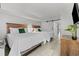 Bright bedroom featuring two queen beds, neutral walls, and modern decor at 7200 Ocean Blvd. N # 254, Myrtle Beach, SC 29572