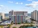 Coastal high-rise resort building with a multi-level parking deck and distant views of the ocean at 7200 Ocean Blvd. N # 254, Myrtle Beach, SC 29572