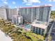 Coastal resort showcasing multiple buildings, a pool, beach access, and lush landscaping at 7200 Ocean Blvd. N # 254, Myrtle Beach, SC 29572