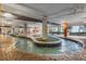 Indoor lazy river with lush landscaping, perfect for a relaxing and scenic ride at 7200 Ocean Blvd. N # 254, Myrtle Beach, SC 29572