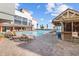 Inviting resort pool area featuring a tiki bar and comfortable lounge seating at 7200 Ocean Blvd. N # 254, Myrtle Beach, SC 29572