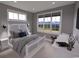 Bright bedroom with scenic views, showcasing a comfortable bed and modern décor at 409 N Highland Way, Myrtle Beach, SC 29572