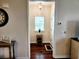 Entryway view shows the front door with a side table and stylish decorations at 516 Papyrus Circle # 516, Little River, SC 29566